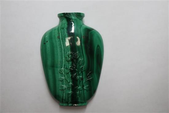 A Chinese malachite snuff bottle and three porcelain snuff bottles, 19th / 20th century (4) Tallest 9cm